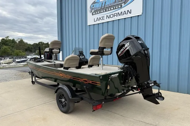 Slide: The Image of 2026 Tracker Bass Tracker Classic Limited boat at Lake Norman dealership. - 5