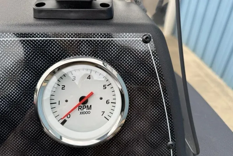 Slide: The Image of RPM gauge on 2026 Tracker Bass Tracker Classic Limited dashboard. - 9