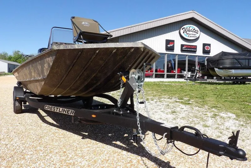 Slide: The Image of 2026 Crestliner 1860 Retriever CC Tunnel boat on trailer at White's Marine Center. - 37