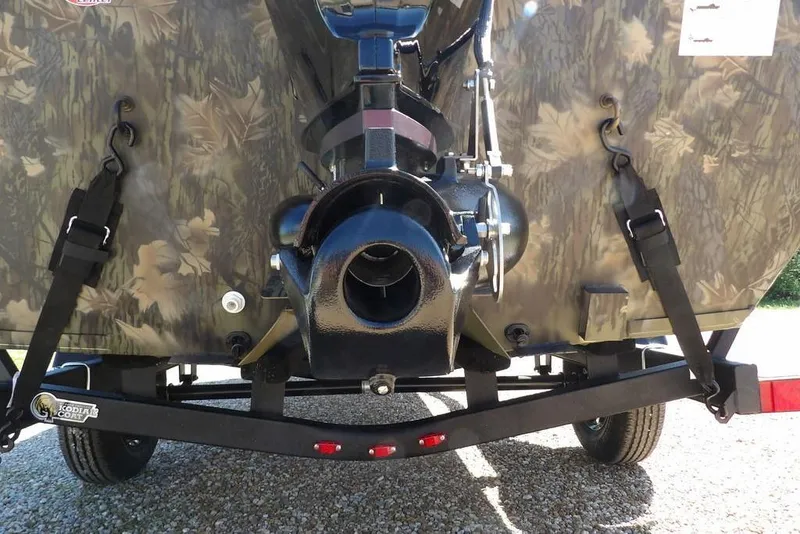 Slide: The Image of Rear view of 2026 Crestliner 1860 Retriever CC Tunnel boat on trailer. - 38