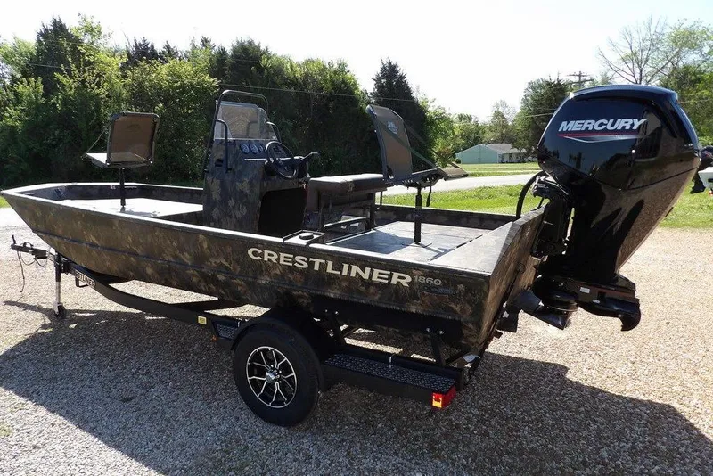 Slide: The Image of 2026 Crestliner 1860 Retriever CC Tunnel boat with Mercury engine on trailer. - 5