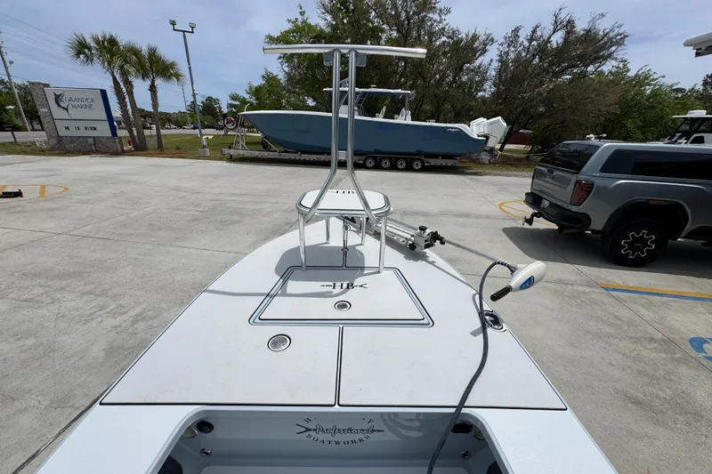 Slide: The Image of 2016 Hell's Bay Professional boat on display at Grander Marine dealership. - 17