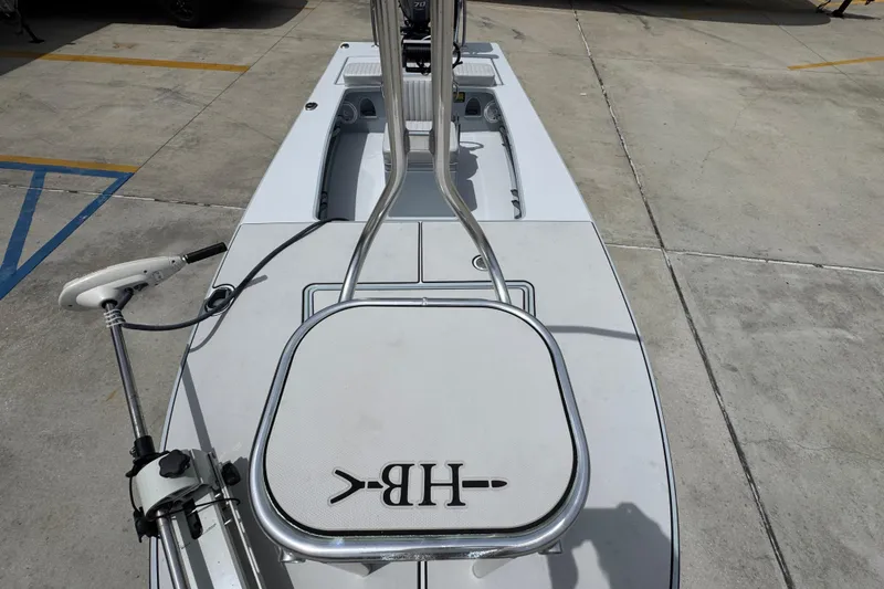 Slide: The Image of 2016 Hell's Bay Professional boat deck with trolling motor and HB logo. - 21