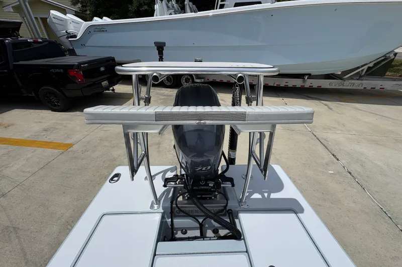 Slide: The Image of 2016 Hell's Bay Professional boat with Yamaha engine, parked on a trailer. - 34