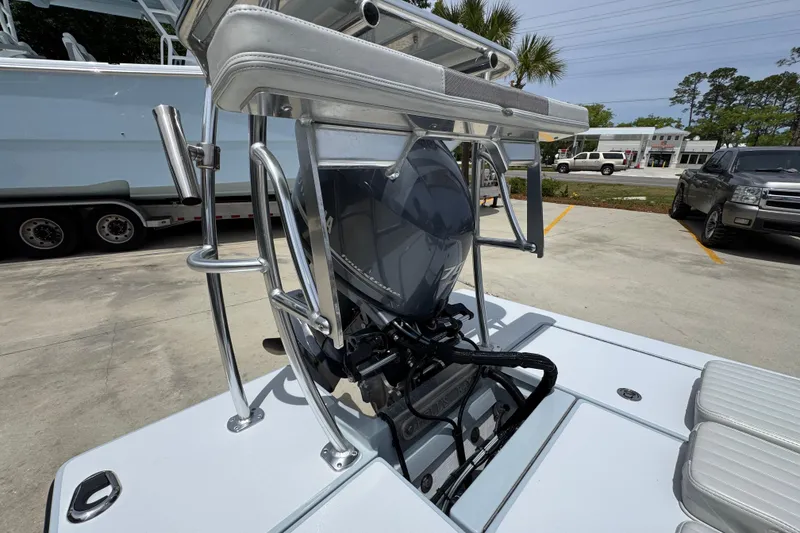 Slide: The Image of 2016 Hell's Bay Professional boat with Yamaha outboard motor in a parking lot. - 36