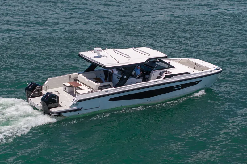 Slide: The Image of Aquila 45 Sport 2026 on water, luxury motorboat. - 0