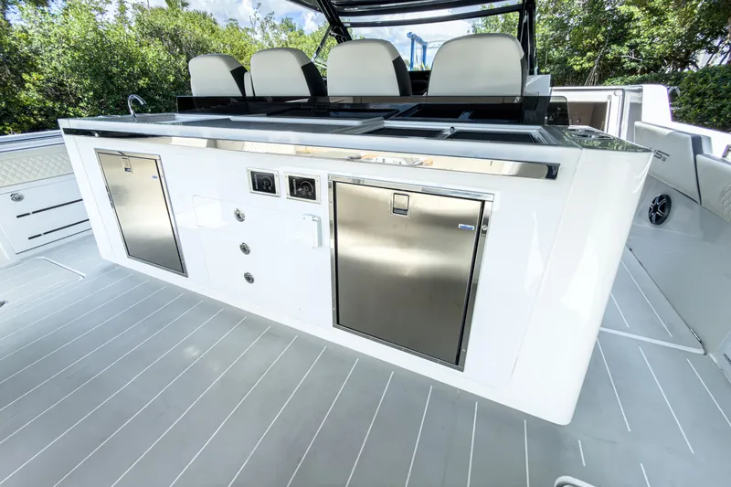 Slide: The Image of Aquila 45 Sport 2026 yacht featuring modern outdoor kitchen. - 10