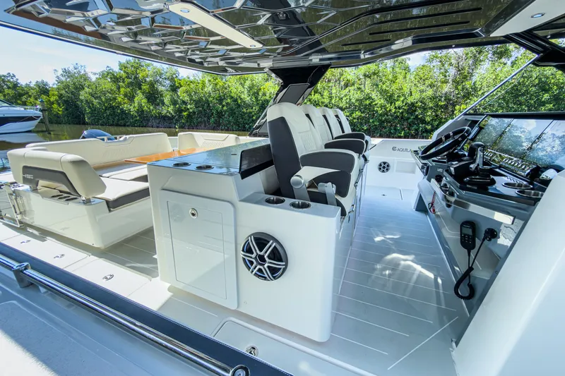Slide: The Image of Interior of 2026 Aquila 45 Sport yacht with luxurious seating. - 14