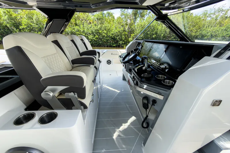 Slide: The Image of Interior of 2026 Aquila 45 Sport with luxurious seating and modern controls. - 16