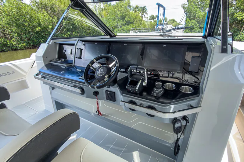 Slide: The Image of Aquila 45 Sport 2026 cockpit with modern controls. - 17