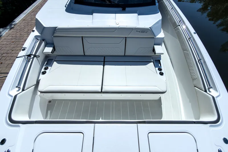 Slide: The Image of Aquila 45 Sport 2026 boat with luxurious seating area. - 24