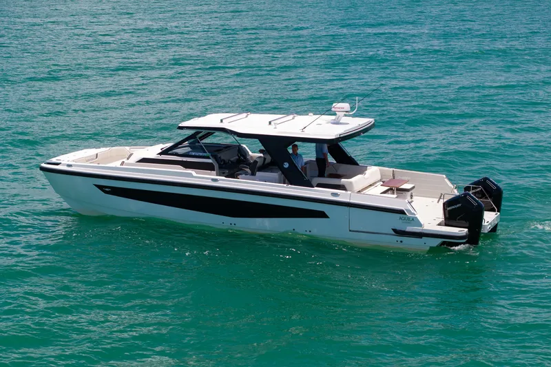 Slide: The Image of Aquila 45 Sport 2026 motorboat on open water. - 26