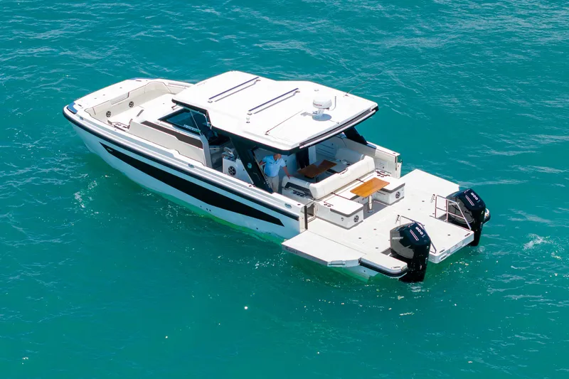 Slide: The Image of Aquila 45 Sport 2026 on blue water, luxury motorboat. - 27