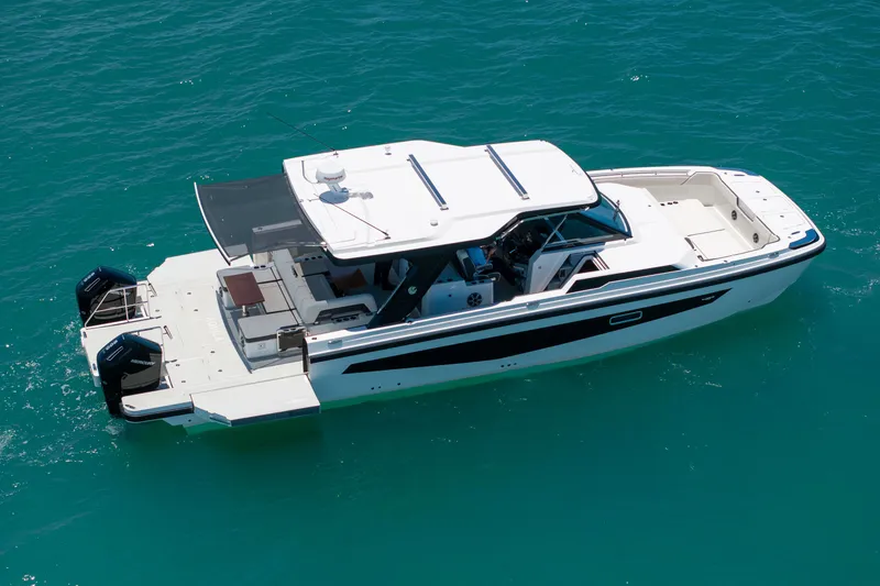 Slide: The Image of Aquila 45 Sport 2026 on blue water, luxury motorboat. - 29