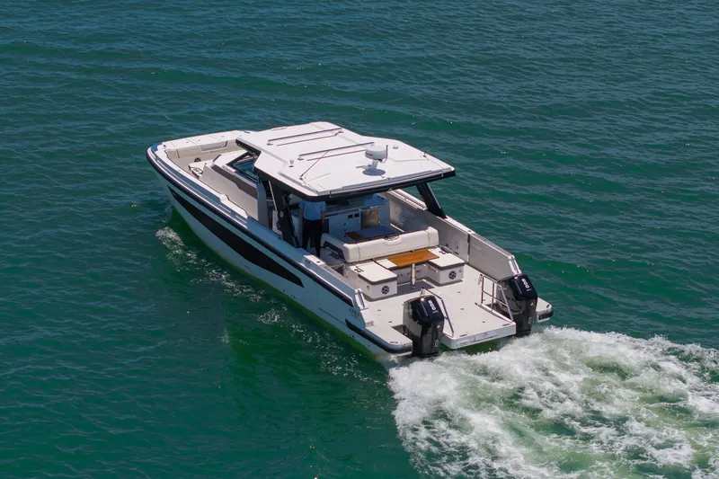 Slide: The Image of Aquila 45 Sport 2026 on water, luxury motorboat. - 30