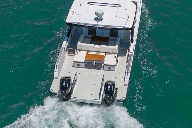 Slide: The Image of Aquila 45 Sport 2026 on open sea, rear view. - 5