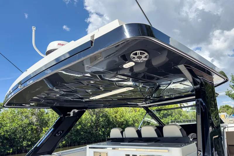 Slide: The Image of Aquila 45 Sport 2026 featuring sleek roof design and speakers. - 8