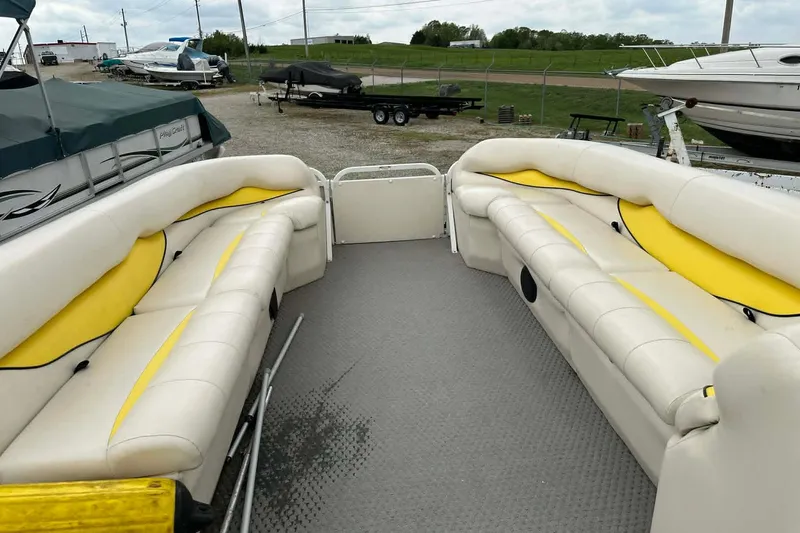 Slide: The Image of 2011 Bentley Pontoons 250/253 Elite Admiral with spacious seating and yellow accents. - 10
