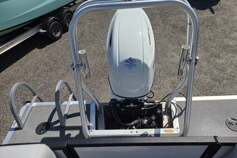 Slide: The Image of 2022 Bentley Pontoons 240 Navigator with Suzuki outboard motor, rear view. - 12