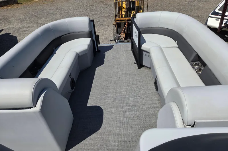 Slide: The Image of 2022 Bentley Pontoons 240 Navigator interior with spacious seating and modern design. - 6