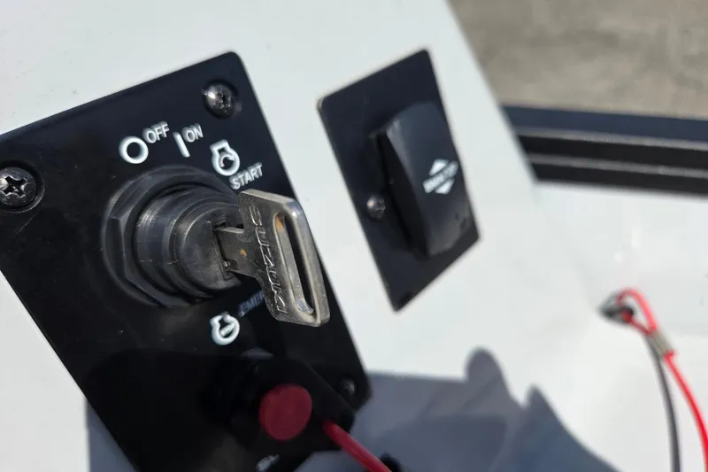 Slide: The Image of Close-up of ignition switch on 2022 Bentley Pontoons 240 Navigator boat. - 8