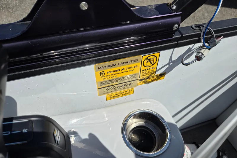 Slide: The Image of 2022 Bentley Pontoons 240 Navigator capacity label, showing 16-person limit and safety warnings. - 9