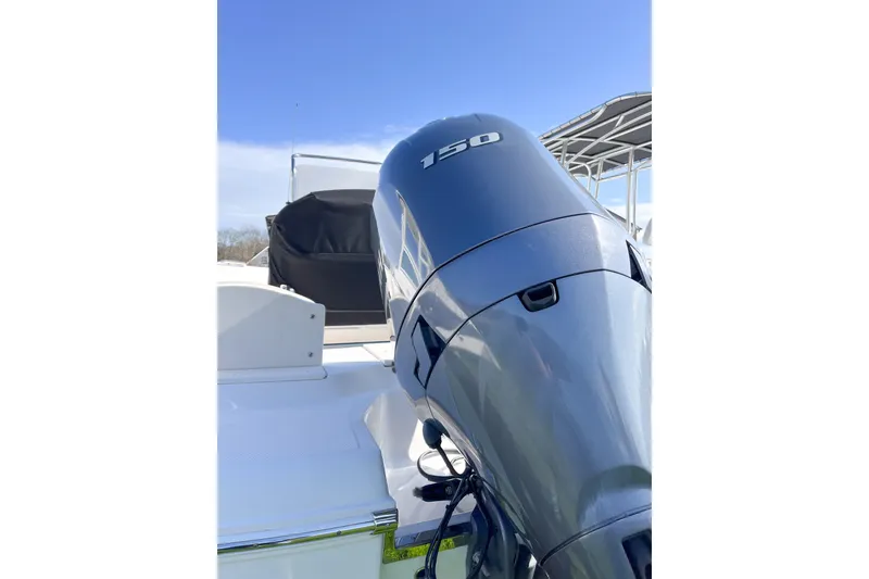 Slide: The Image of 2018 Robalo R180 Center Console boat with powerful 150 horsepower engine. - 13