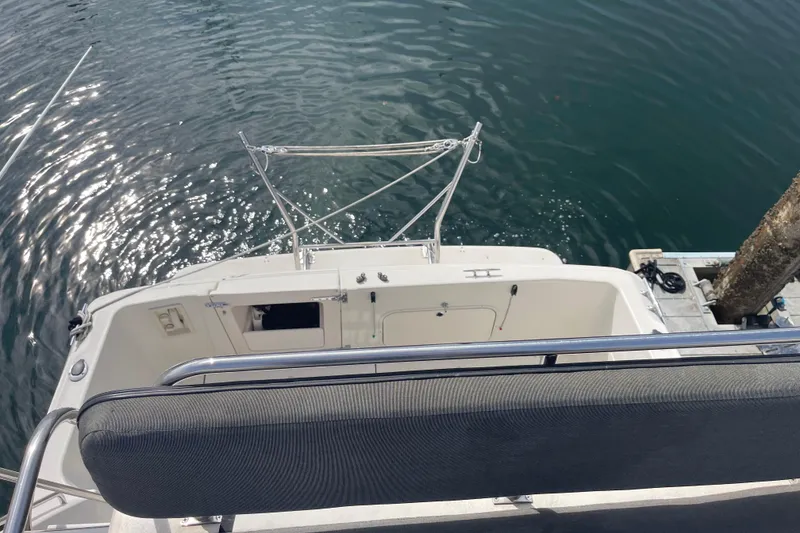 Slide: The Image of 1996 Bayliner 3255 Avanti boat deck overlooking calm water. - 11