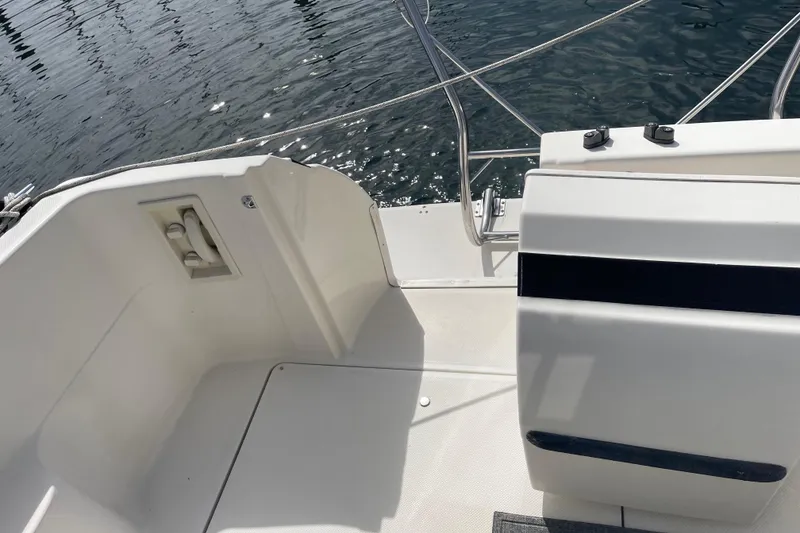 Slide: The Image of 1996 Bayliner 3255 Avanti boat deck with railing, overlooking water. - 13