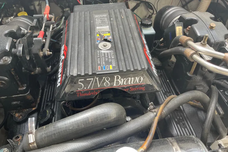 Slide: The Image of Engine of 1996 Bayliner 3255 Avanti with 5.7L V8 Bravo, featuring power steering. - 42