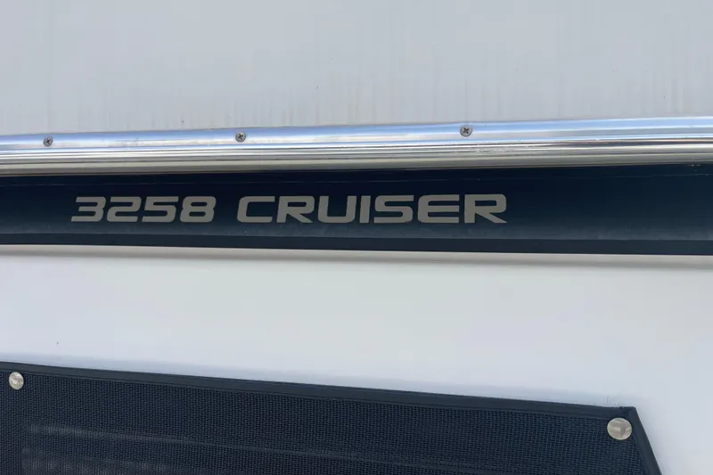Slide: The Image of Close-up of "3258 Cruiser" text on a 1996 Bayliner 3255 Avanti boat. - 6