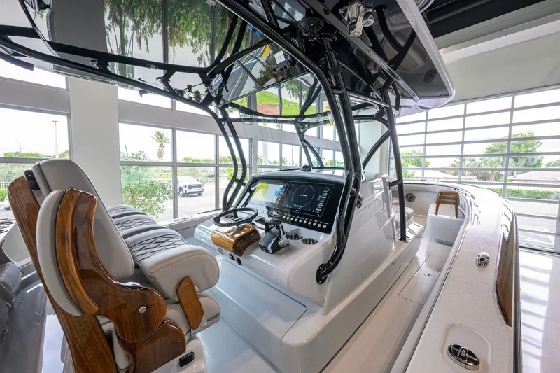 Slide: The Image of 2026 Valhalla Boatworks V-37 interior with advanced navigation system and luxurious seating. - 20