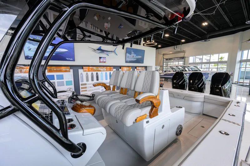 Slide: The Image of Interior of 2026 Valhalla Boatworks V-37, showcasing luxurious seating and modern controls. - 24