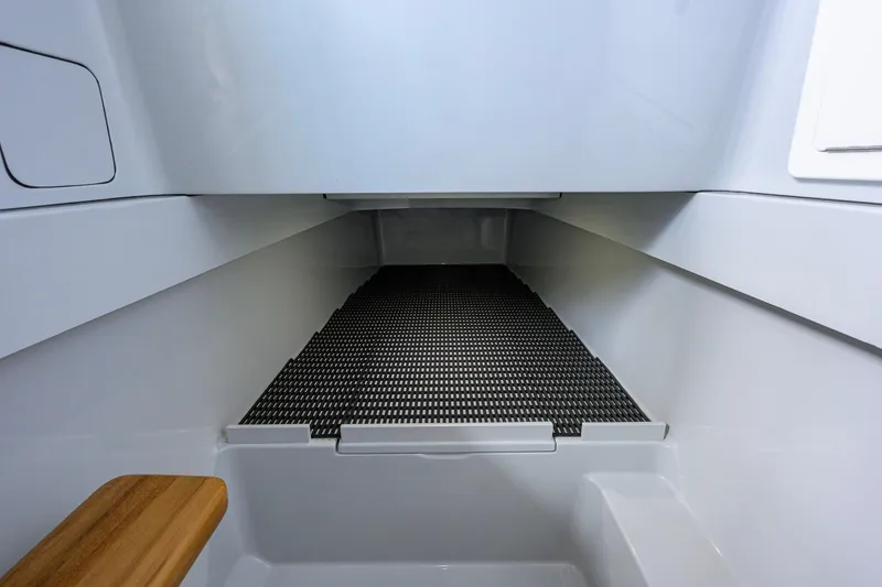 Slide: The Image of Interior view of 2026 Valhalla Boatworks V-37 cabin with sleek design and wooden accents. - 25