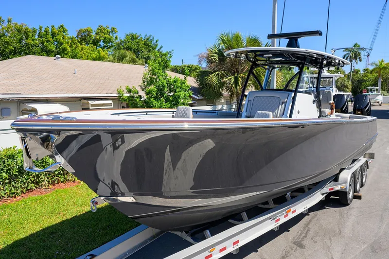 The Image of 2026 Valhalla Boatworks V-37 on trailer, sleek design, parked outdoors. - 3