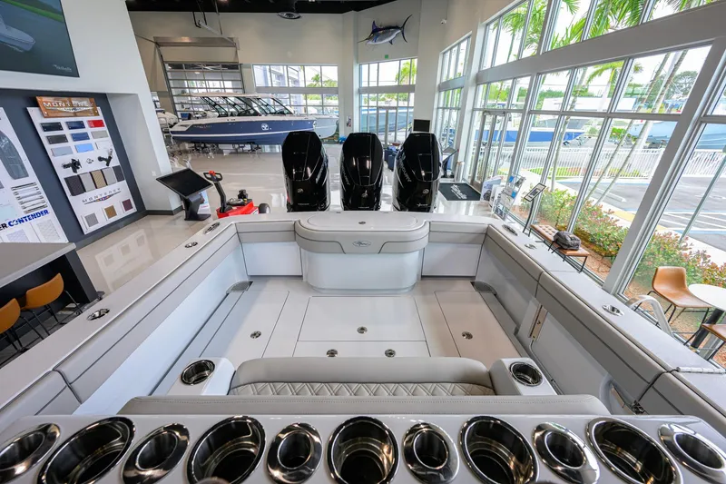 Slide: The Image of 2026 Valhalla Boatworks V-37 interior with triple engines in a showroom setting. - 30