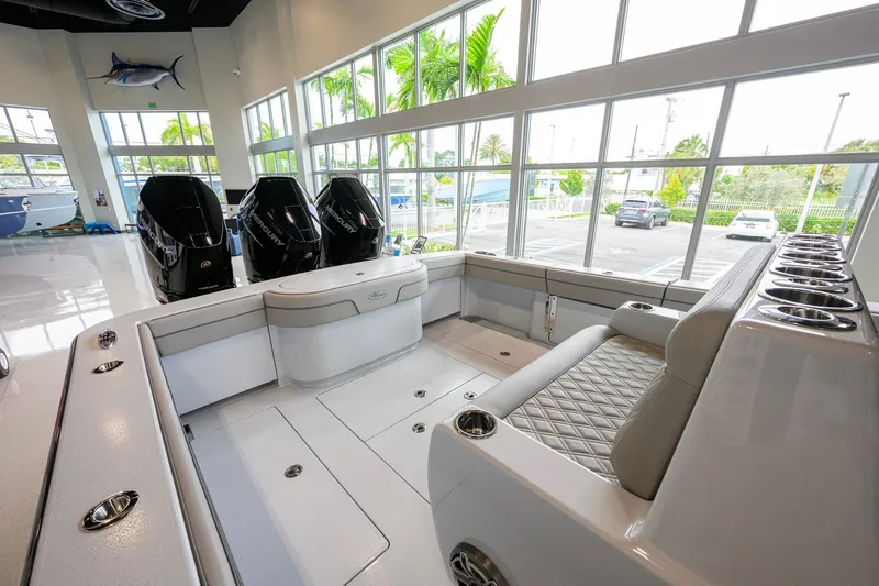 Slide: The Image of 2026 Valhalla Boatworks V-37 interior with luxurious seating and powerful Mercury engines. - 32