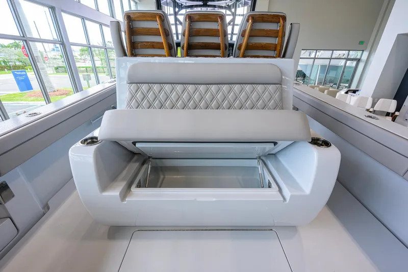 Slide: The Image of 2026 Valhalla Boatworks V-37 interior with luxurious seating and storage compartment. - 37
