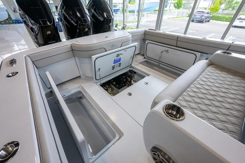 Slide: The Image of 2026 Valhalla Boatworks V-37 interior with storage compartments and seating. - 42