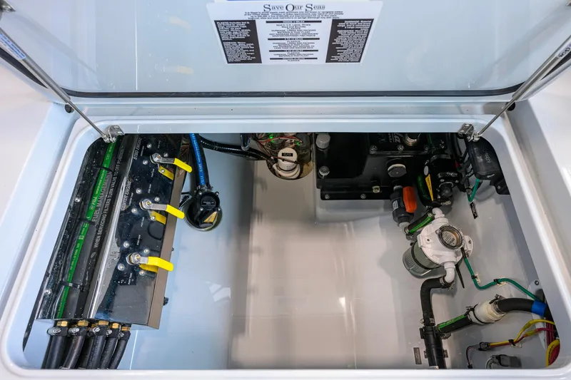 Slide: The Image of Engine compartment of 2026 Valhalla Boatworks V-37, showcasing mechanical components and wiring. - 46