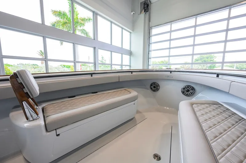 Slide: The Image of 2026 Valhalla Boatworks V-37 interior with cushioned seating and modern design. - 6