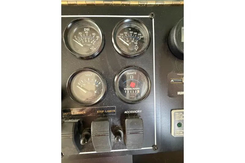 Slide: The Image of Control panel of a 2000 Sunstar 16x65 with gauges and switches. - 10