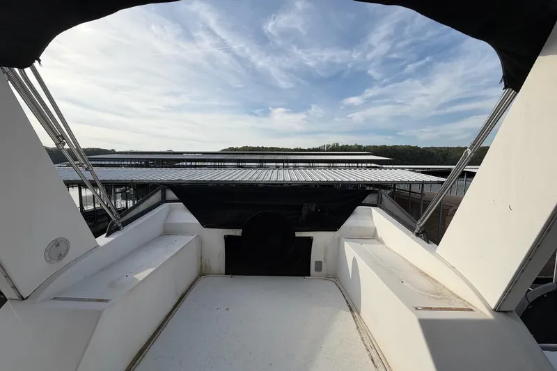 Slide: The Image of View from Sunstar 16x65 houseboat deck, 2000 model, overlooking marina and sky. - 45