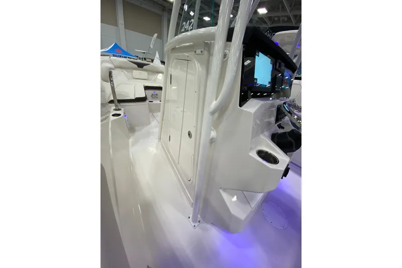 Slide: The Image of 2024 Sailfish 242 CC boat interior with modern console and seating. - 15