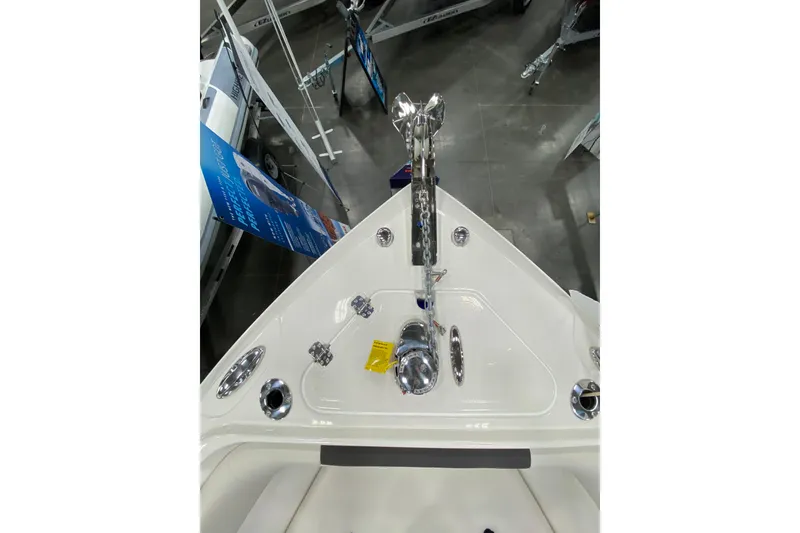 Slide: The Image of 2024 Sailfish 242 CC boat bow with anchor and deck fittings. - 20