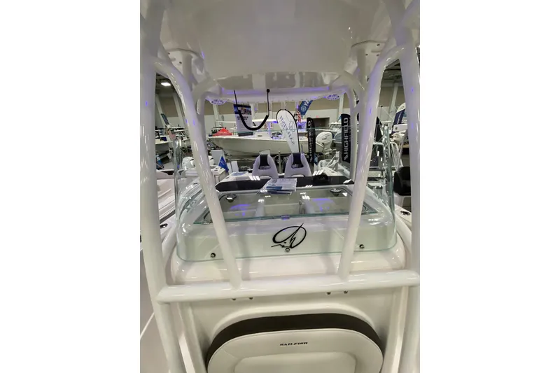Slide: The Image of 2024 Sailfish 242 CC boat interior with modern console and seating. - 4