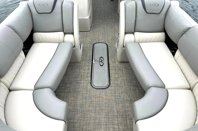 Slide: The Image of Luxurious seating on 2018 Harris Grand Mariner 250 pontoon boat, featuring elegant gray upholstery. - 17