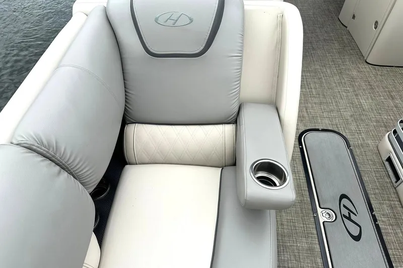 Slide: The Image of Luxurious seating on 2018 Harris Grand Mariner 250 pontoon boat with cup holder. - 19