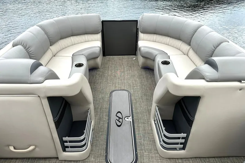 Slide: The Image of 2018 Harris Grand Mariner 250 pontoon boat interior with plush seating and cup holders. - 22