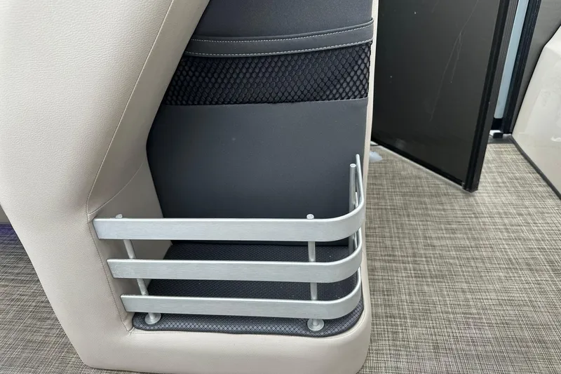 Slide: The Image of Interior detail of 2018 Harris Grand Mariner 250 boat, featuring a storage compartment. - 23